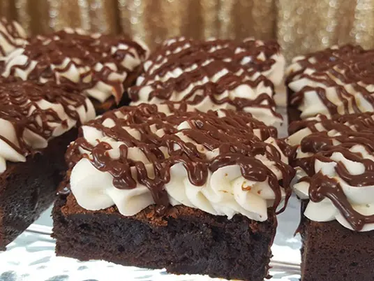 Cream cheese brownies with chocolate drizzle