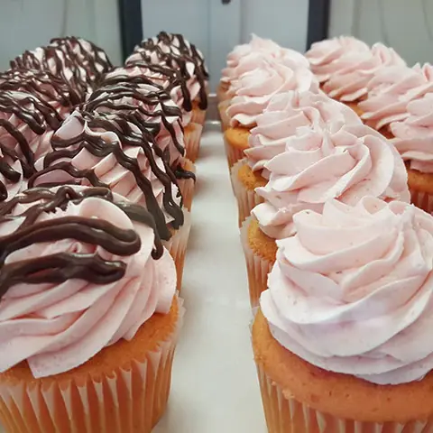 Caramel drizzle cupcakes in the case