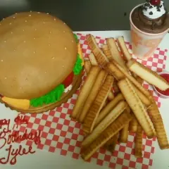 A hamburger and fries cake