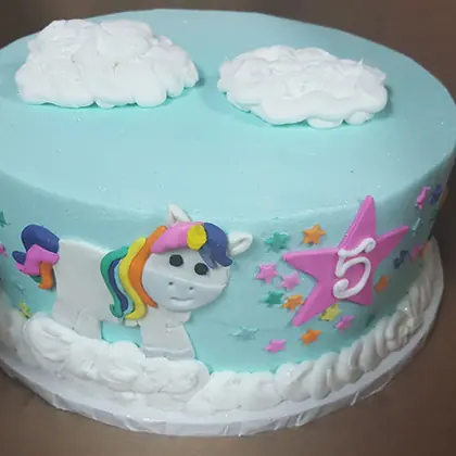 A unicorn and clouds cake