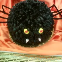 A fuzzy spider cake