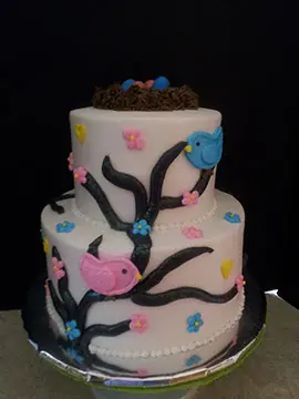 Pink tiers with cherry blossom branches
