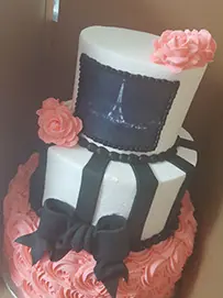 Pink ruffle tiers with a monogram